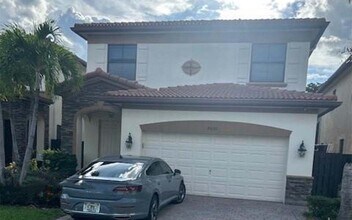 Building Photo - 8660 NW 101st Pl