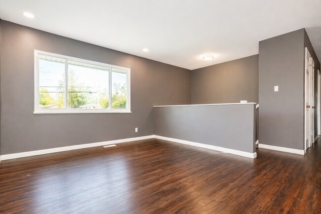 Building Photo - This charming 5-bedroom, 2-bathroom home is available for $2,000/month.