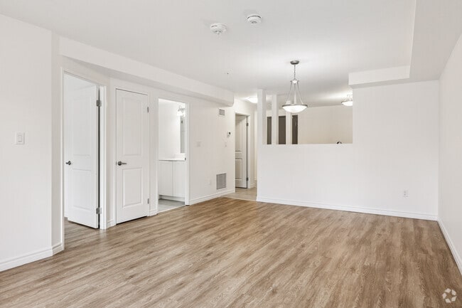 1BR, 1BA - 786SF - Living Room - 220 Ira Needles Blvd