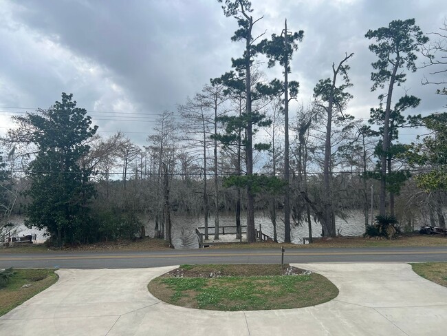 Building Photo - Waterfront Property! 3 Bed / 2 Bath Moss Bluff Home