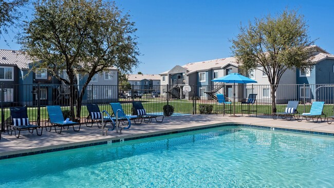 Jump into refreshing waters or soak up the sun on our poolside loungers, where serenity and splendor unite. - Riverwood Apartments