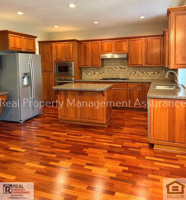 Building Photo - 13611 NW Stonebridge Dr