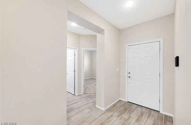 Front door, bathroom and bedroom - 4459 S Glory Vine Ln