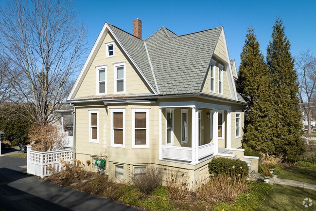 Split-level home with warm beige siding located in downtown Palatine.