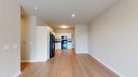 Located at 151 S Davis Rd in LaGrange, GA, this single-floor, 3-bedroom, 2-bathroom home offers a clean, modern design with a practical and comfortable layout. Light-toned luxury vinyl plank flooring flows through the main living areas, complementing the bright, neutral color palette found throughout the space.

The open-concept kitchen and dining area serves as the heart of the home, featuring crisp white cabinetry with contemporary hardware, dark countertops, and a full suite of black appliances including a refrigerator, dishwasher, range, and microwave. A double sink and abundant upper and lower cabinet storage make this kitchen as functional as it is visually appealing.

The spacious living room provides an airy, open feel with a ceiling fan and direct access to a private balcony, allowing for natural light and outdoor enjoyment. A connecting hallway leads to the three bedrooms, each finished with plush carpeting and ceiling fans. The generously sized primary bedroom includes large windows that bring in natural light and features access to its own closet space. Throughout the home, five closets provide exceptional storage capacity.

The two bathrooms are finished with white vanity cabinetry, dark countertops, and modern light fixtures. A dedicated laundry area and utility room add further convenience to this thoughtfully designed home.
