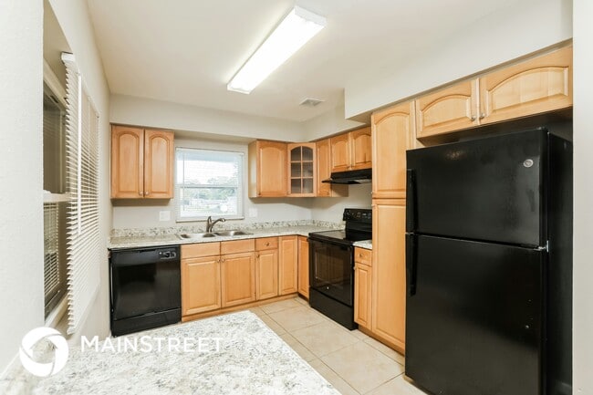 Building Photo - 6908 Ambassador Dr