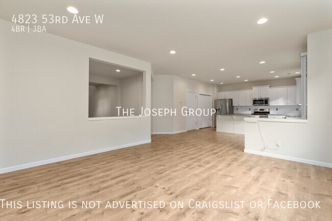 Foto del edificio - Spacious 4-Bedroom with Chefs Kitchen and ...