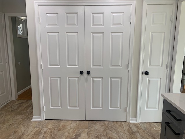 Washer and Dryer Closet located in the kitchen. - 21 Oak Rd