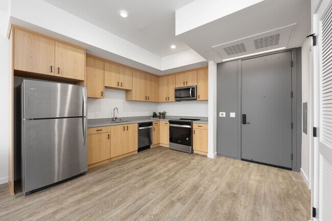 Interior Photo - The Cue | Modern Downtown apartments with gated access, rooftop terrace, central courtyard, and d...