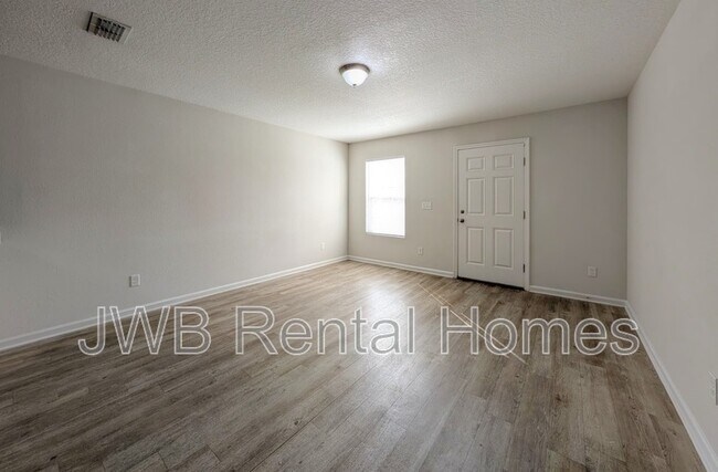 Building Photo - 8476 McGirts Village Ln