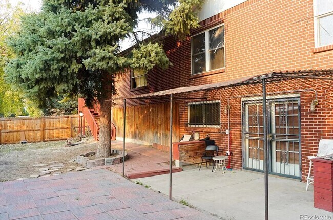 Separate entrance, there are also separate entrances through the front of the home. - 1685 S Kenton Way