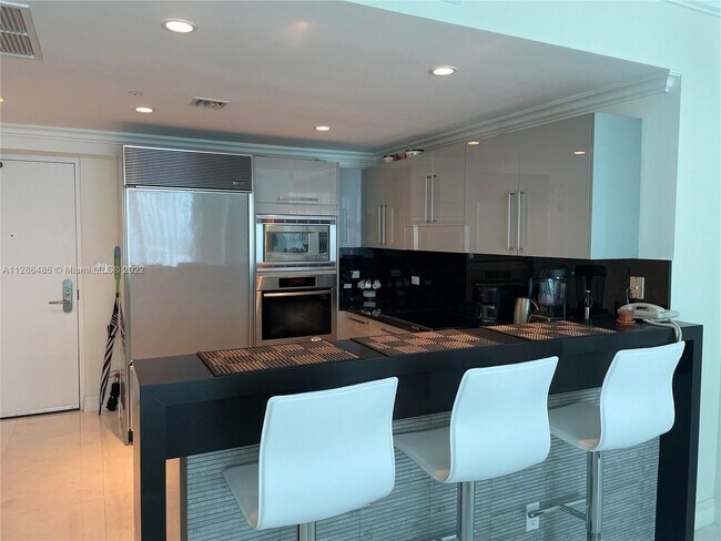 Building Photo - 6799 Collins Ave