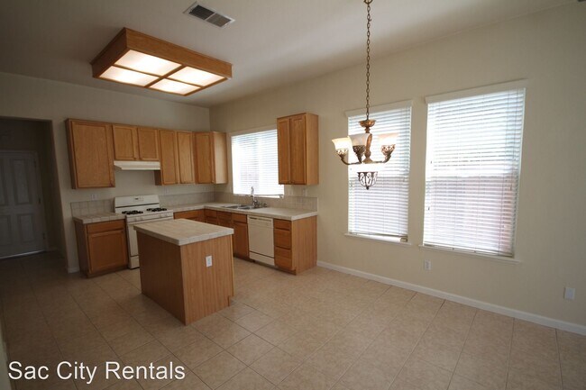 Building Photo - 4 br, 3.5 bath House - 9808 Burrowing Owl Way