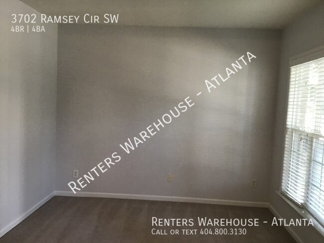 Building Photo - Beautiful and Large 4 Bedroom w/ Finished ...