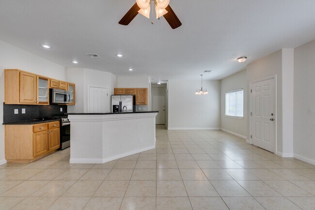 Building Photo - Great townhome in Henderson Gated Community with a 2 car attached garage and backyard