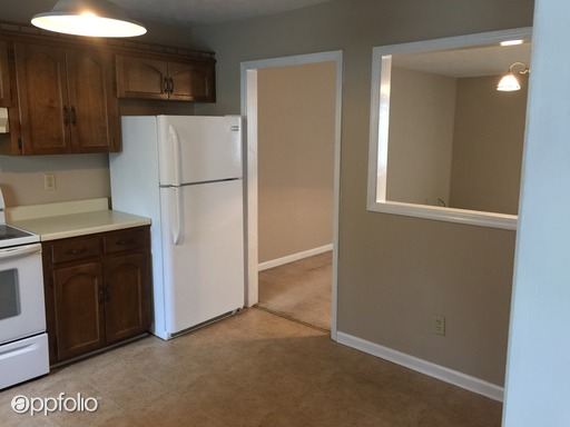 Building Photo - 5609 Woodgate Cir
