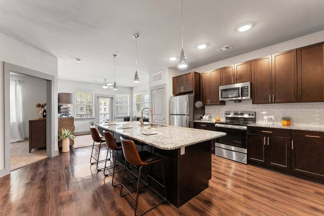 Open kitchen concept with views into the living room - Discovery Park