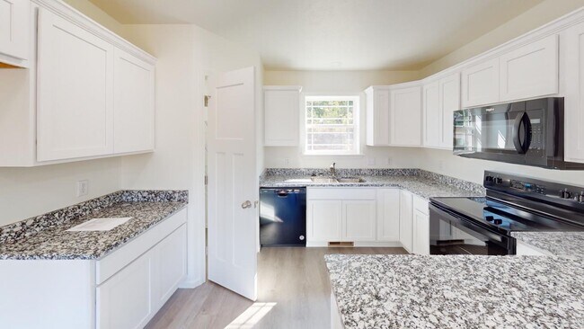 Foto del edificio - 124 E Sunset Cove Ln
