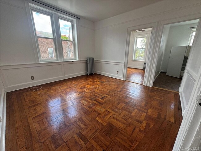 Building Photo - 7438 Jamaica Avenue Unit 2