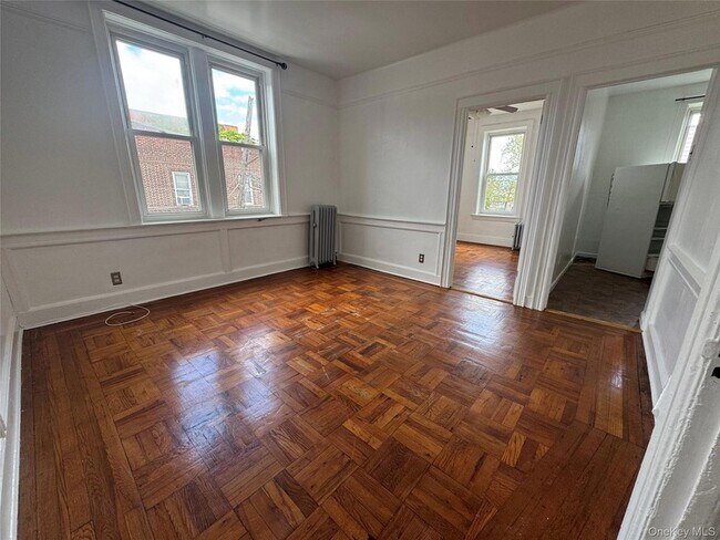 Building Photo - 7438 Jamaica Avenue Unit