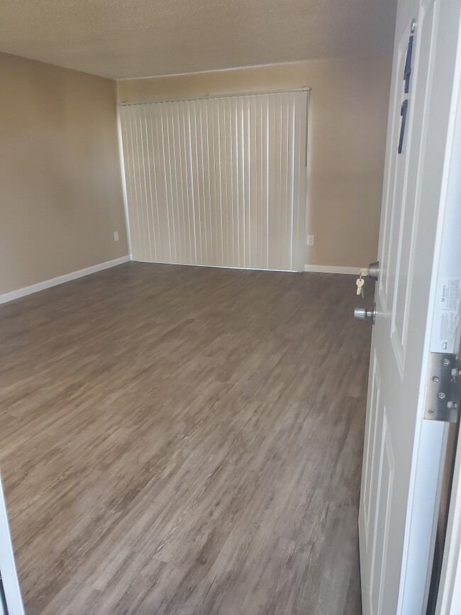 2BR/2BA Living Room - Pine Brook Apartments