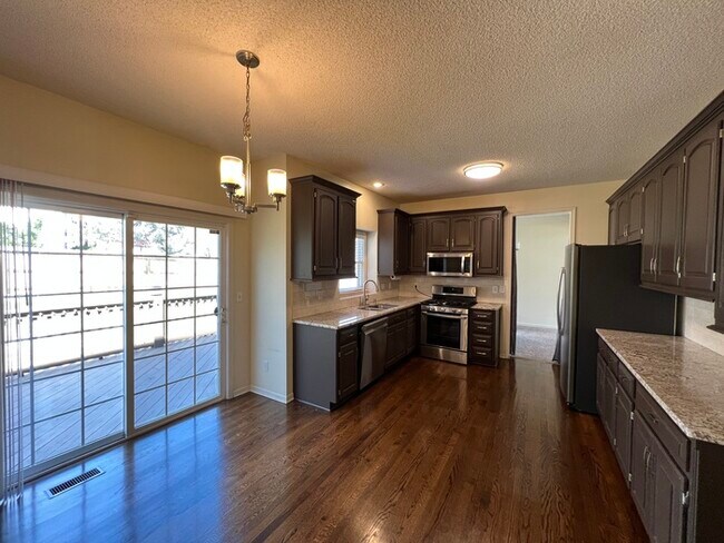 Building Photo - Welcome to this beautiful 4-bedroom, 2.5-b...
