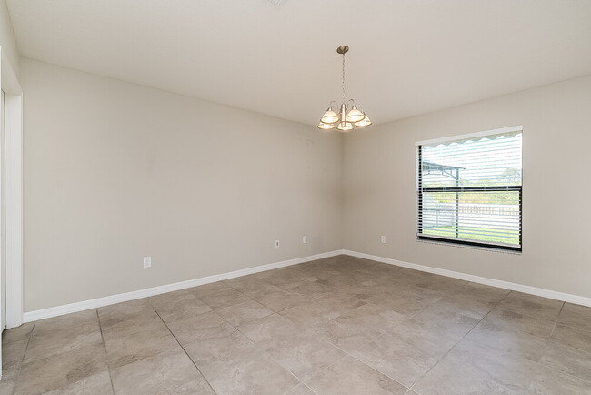 Building Photo - 10114 Rose Petal Pl