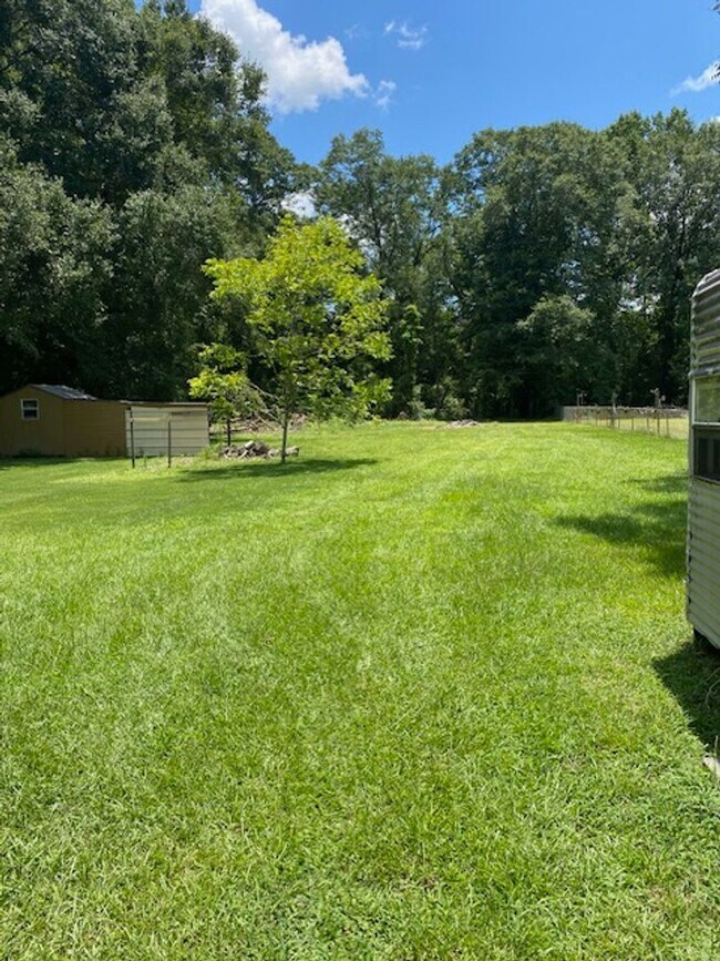 Building Photo - Quiet Living and close to the Back Gate