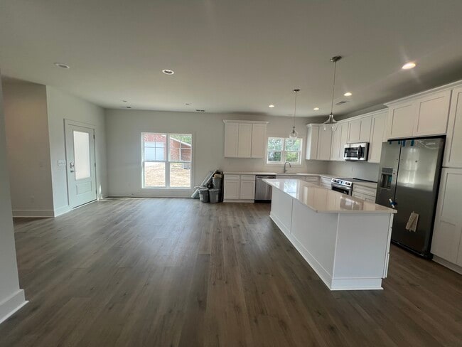 open floor plan for kitchen and dining areav - 132 Hargrove Dr House