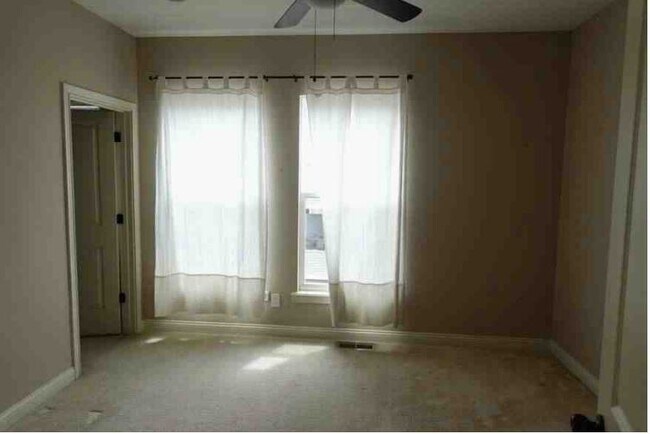 Second bedroom with attached bath & built in closet - 201 E Rochelle St