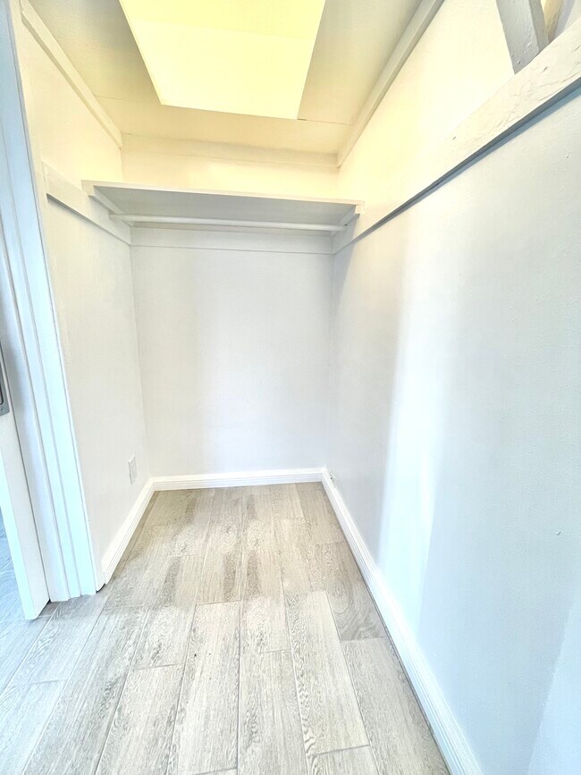 Walk-In Closet Side 1 - 128 Elm Ave