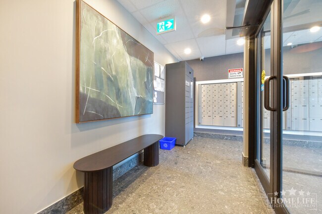 Photo du bâtiment - Beautiful Brand New 2 Bed 1 Bath Condo in Langley City Centre