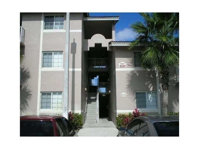 Building Photo - 3241 Sabal Palm Manor