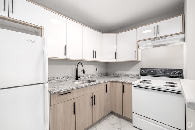 2 habitaciones, 1 baño - 910 pies cuadrados - Cocina - Lansing Grove Apartments