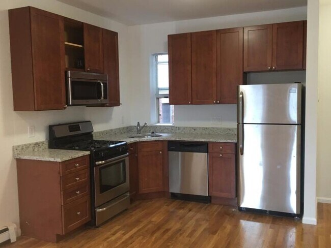 Building Photo - No Brokers Fee, Eat-in Kitchen, Steps from the T Stop
