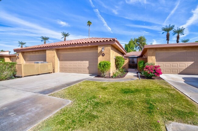 Building Photo - Designer Seville Condo w/ Golf & Mountain ...