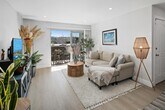 Foto principal - Immaculate 1-Bedroom Upper-Level Condo in ...
