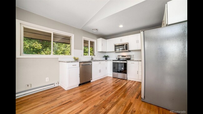 Main level kitchen - 29924 Spruce Canyon Dr