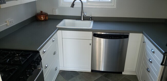 Updated kitchen with stainless applances and huge pots and pans drawers... - 3224 Wellington Rd