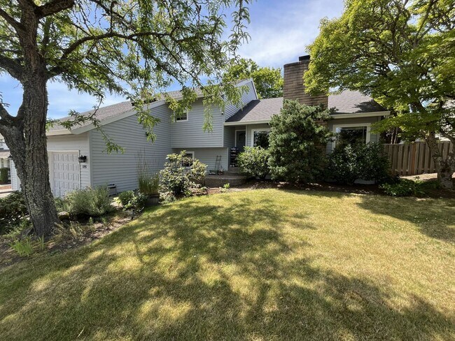 Building Photo - Bright and Open 4 Bedroom Cedar Mill Home with Vaulted Ceilings, Skylights & Multiple Living Areas