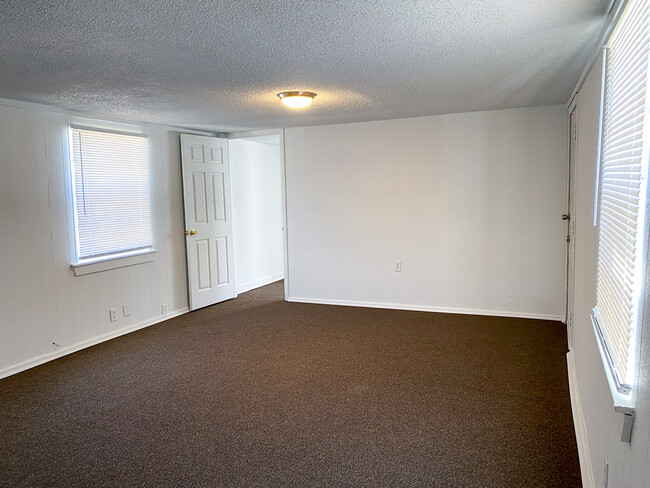 Living room looking from Kitchen - 10604 County Road 1020