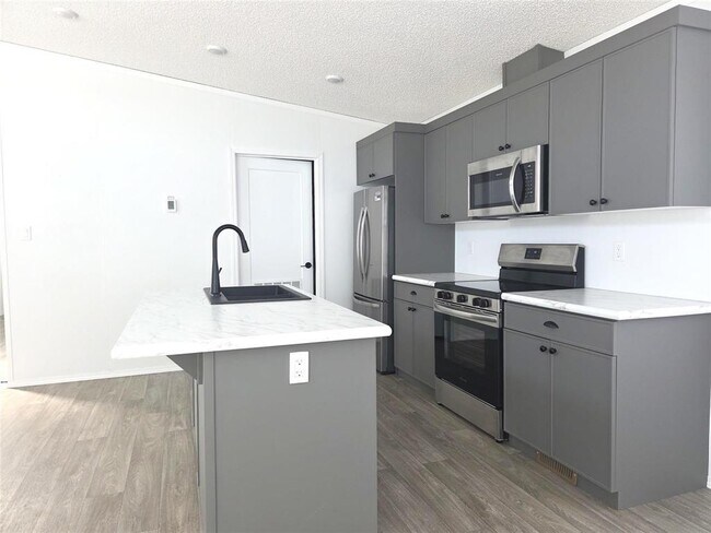 Photo du bâtiment - 61 Prairie Oak Dr