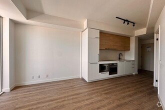 Building Photo - 1555 Queen St E