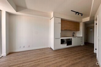 Building Photo - 1555 Queen St E
