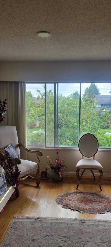 Nice view from the living room to Cherry tree in the front yard - 4461 Inman Av