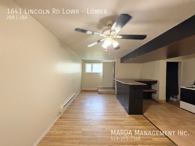 Building Photo - COZY OPEN CONCEPT 2 BED/1 BATH LOWER UNIT - INCLUSIVE!