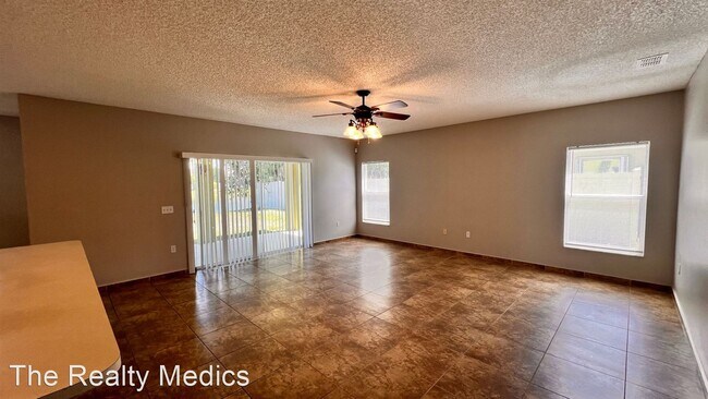 Foto del edificio - 4 br, 2.5 bath House - 4561 Ficus Tree Rd