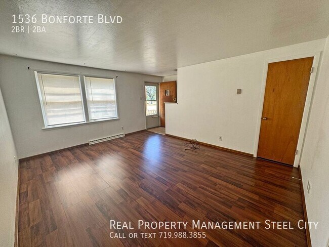 Building Photo - Charming 2-Bedroom Condo in Prime Pueblo L...