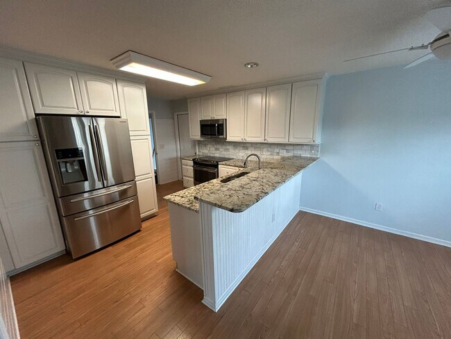 Foto del edificio - Charming home nestled in Courtney Pines with full fenced backyard!