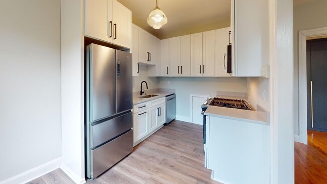 Building Photo - Newly Renovated & Modern Studio Apartment ...